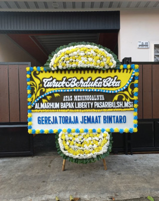 Papan Bunga Duka di Wijirejo